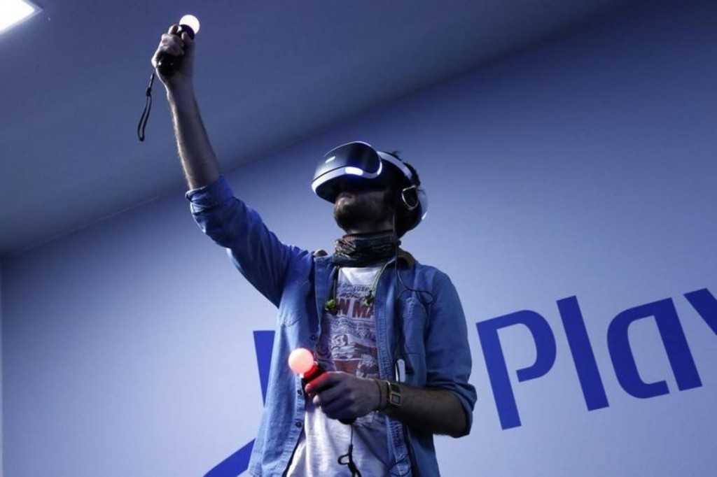 A visitor plays a game on a PlayStation VR at the Paris Games Week, a trade fair for video games in Paris, France, October 28, 2015. REUTERS/Benoit Tessier